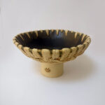 Dark green bowl with embossed leaves